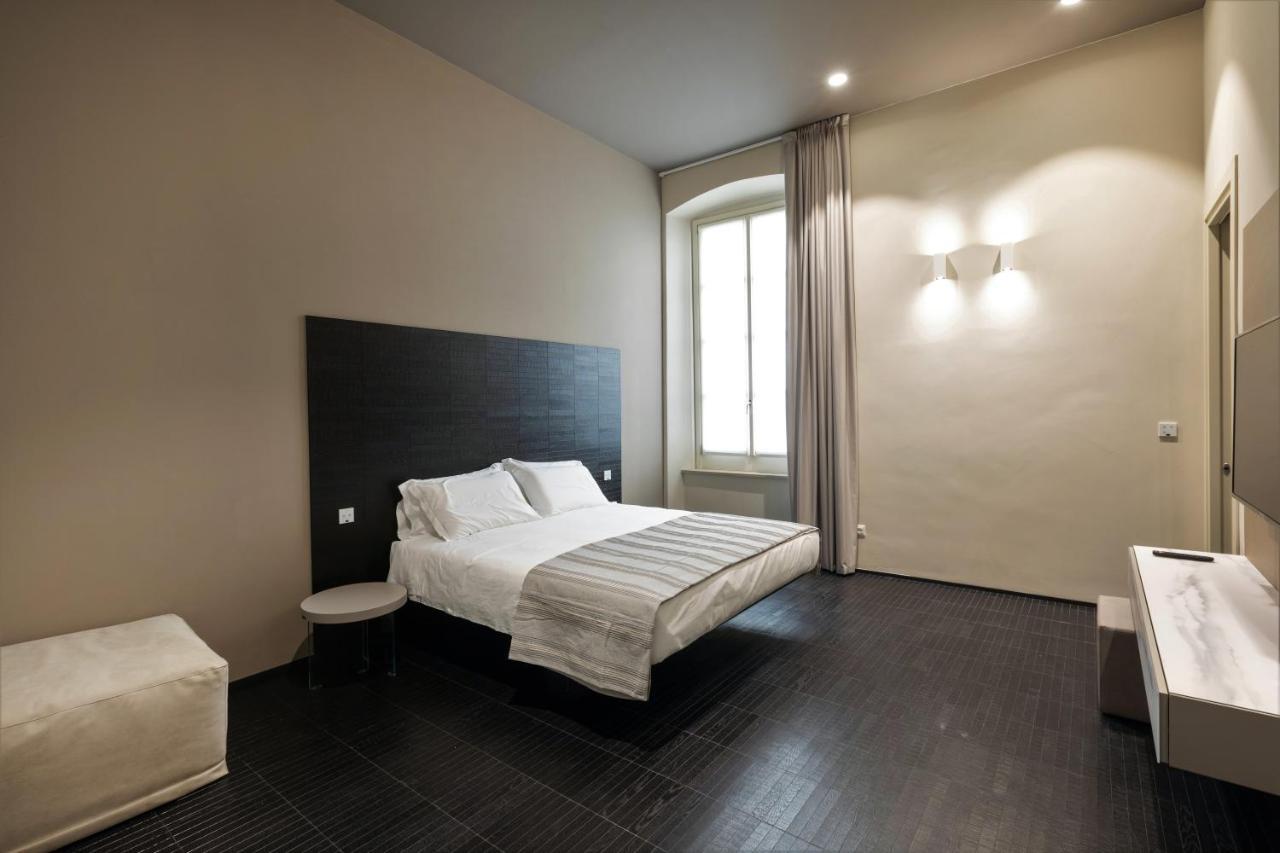 Salina Luxury Suites Parma Bagian luar foto