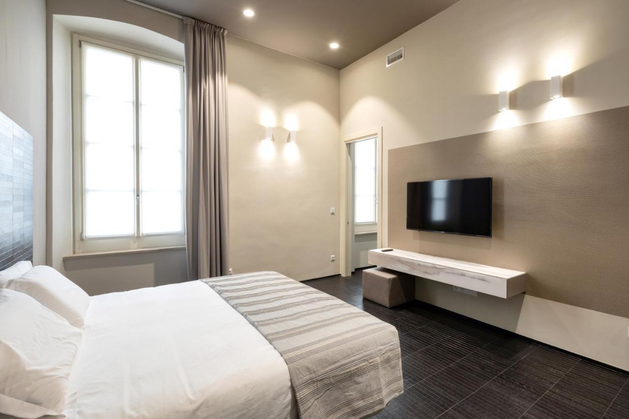 Salina Luxury Suites Parma Bagian luar foto