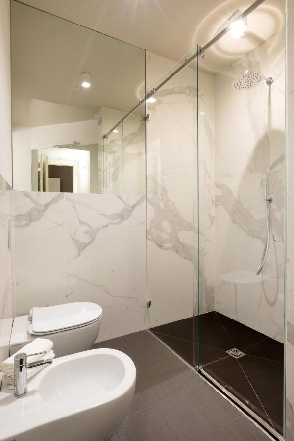 Salina Luxury Suites Parma Bagian luar foto