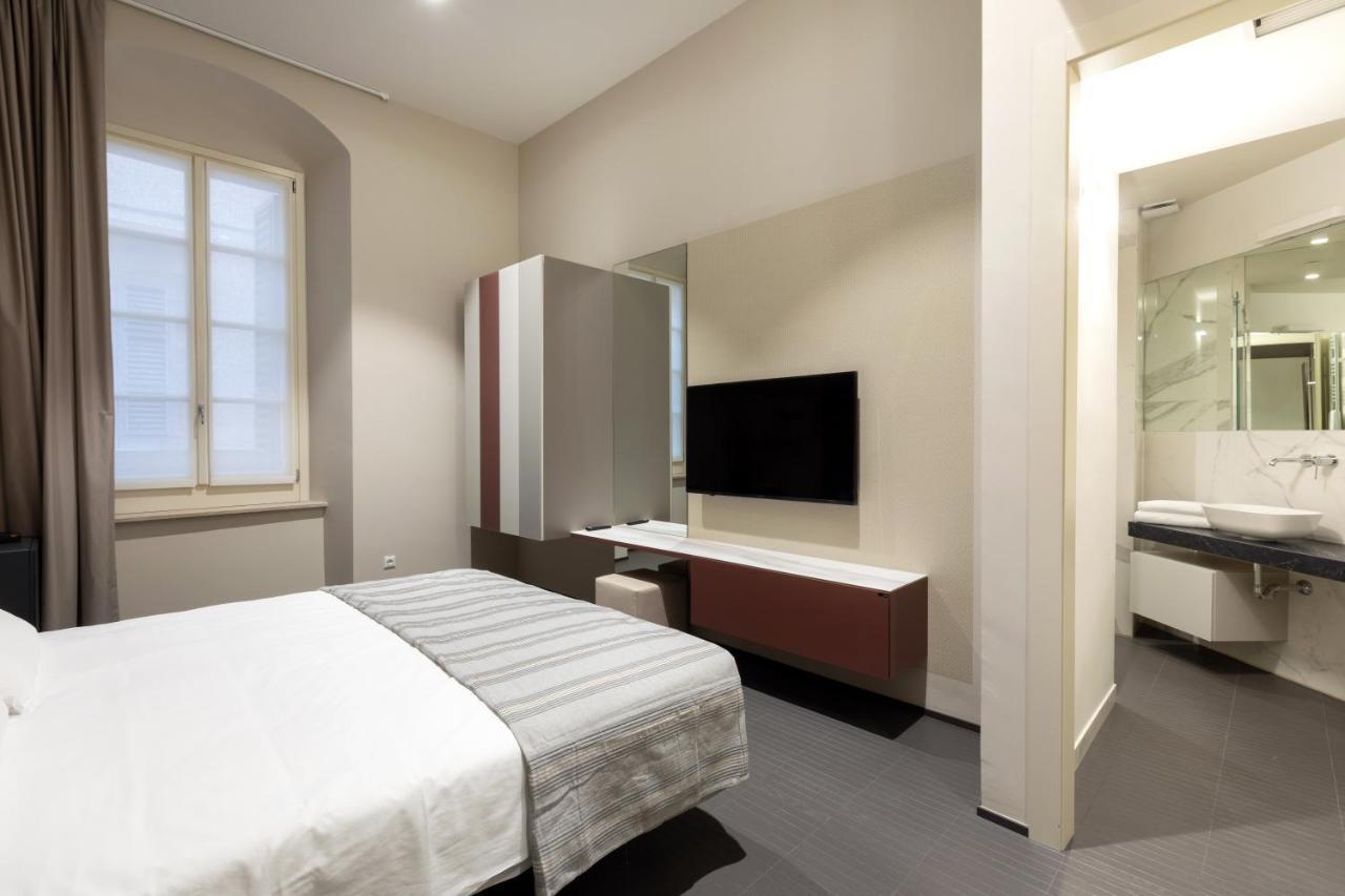 Salina Luxury Suites Parma Bagian luar foto